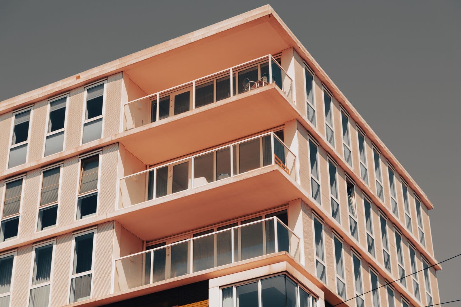 Modern residential facade with generous balconies